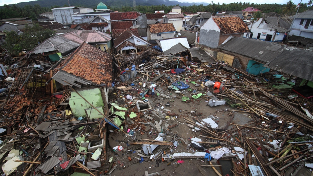 Debris is seen after a tsunami hit at Sumur district in Pandeglang