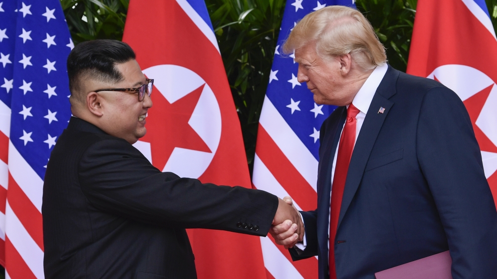 North Korea leader Kim Jong Un and U.S. President Donald Trump shake hands