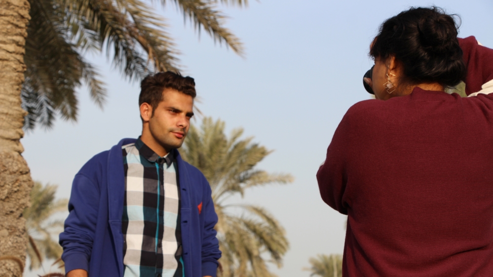 Shahid Sultan is an electrician but hopes to return to Pakistan and work as a model [Ayilah Chaudhary/Al Jazeera]