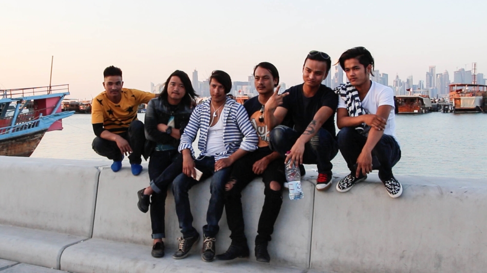 Qatar laborers use lone day off to show fashion sense [Ayilah Chaudhary /Al Jazeera]