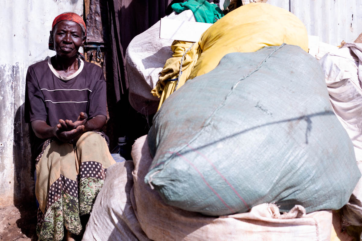 Residents like Rehema Ayako, who live in these slums trek to this trash side to collect metals, electronics, and rubber and plastics bags used for recycling. For 12 years, Ayako has been walking for