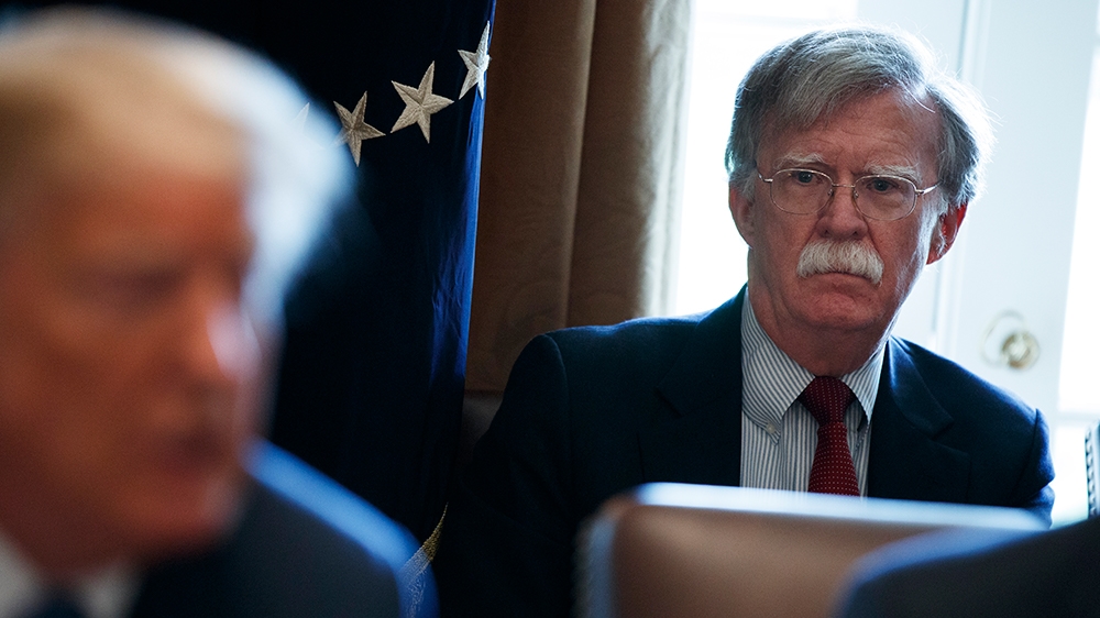 National Security Adviser John Bolton listens as President Donald Trump speaks during a cabinet meeting at the White House, Monday, April 9, 2018, in Washington. (AP Photo/Evan Vucci)