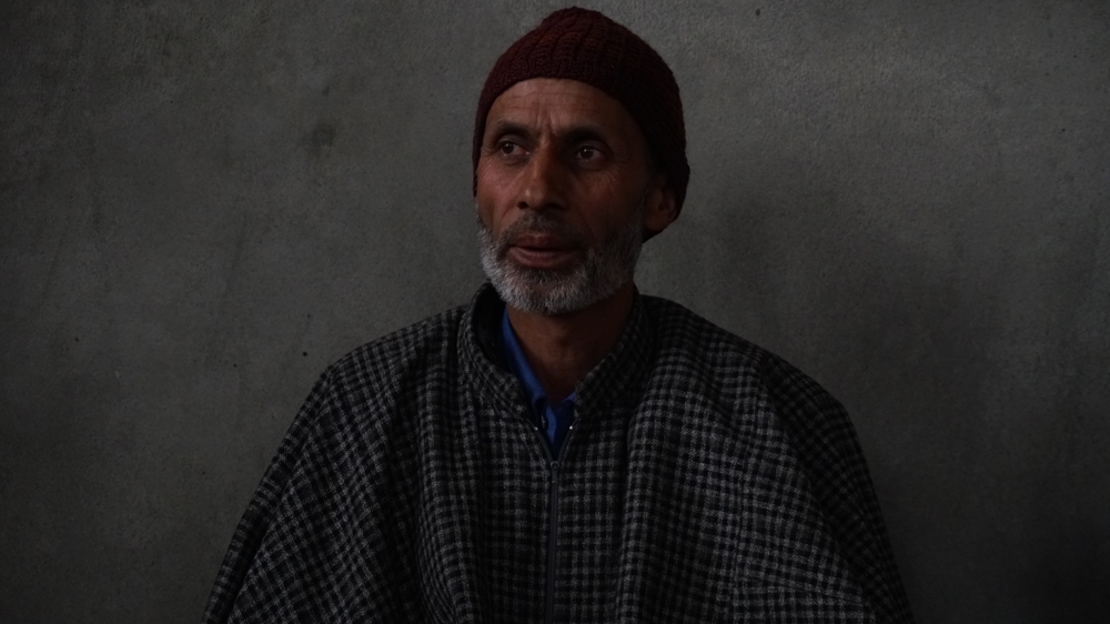 Ghulam Hassan Dar, father of Pulwama suicide attacker Adil Dar, at his home in Gundibagh village of Pulwama [Shabir Bhat/Al Jazeera]