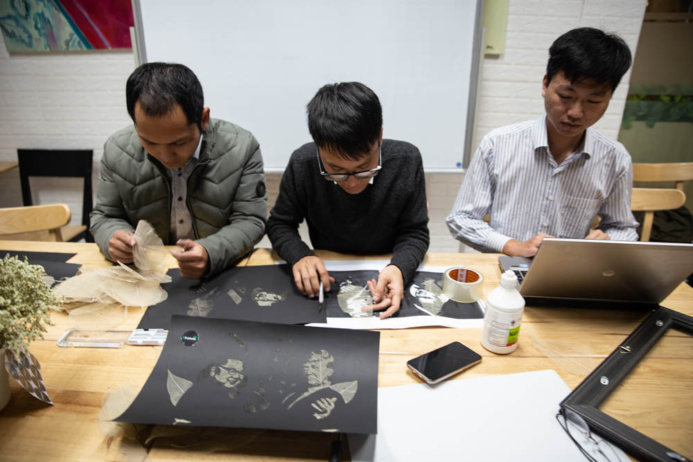 Nguyen Duc Loc, Tran Phi Long and Nguyen Cong Toan are using the US-North Korea summit to showcase their artwork. Replicating photos of the to leaders using dried leaves, the trio hope it will encoura