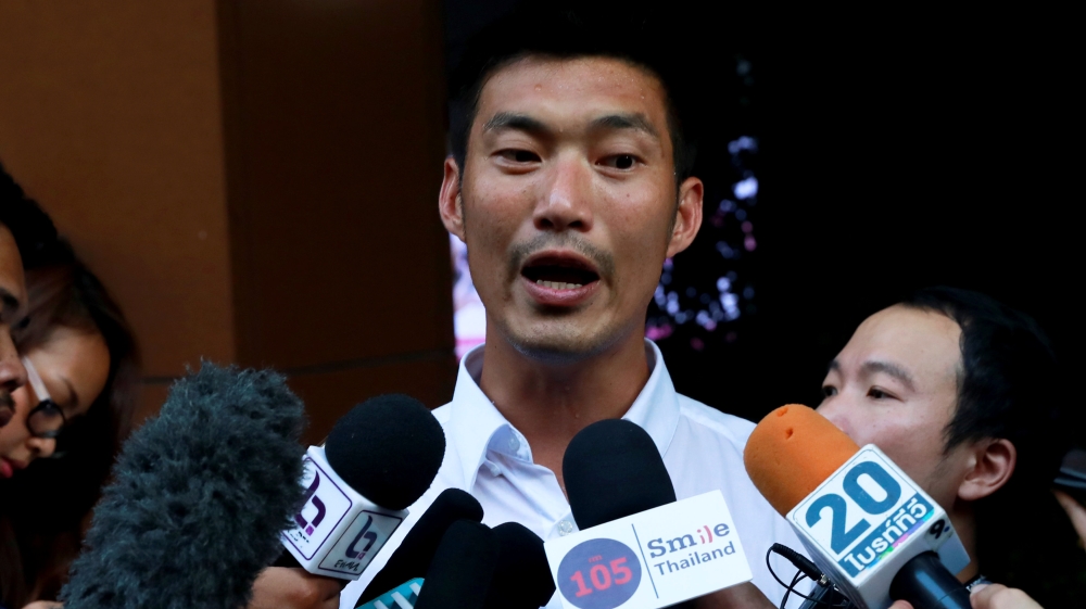 Thanathorn Juangroongruangkit, leader of the Future Forward Party, talks to media [Soe Zeya Tun/Reuters]