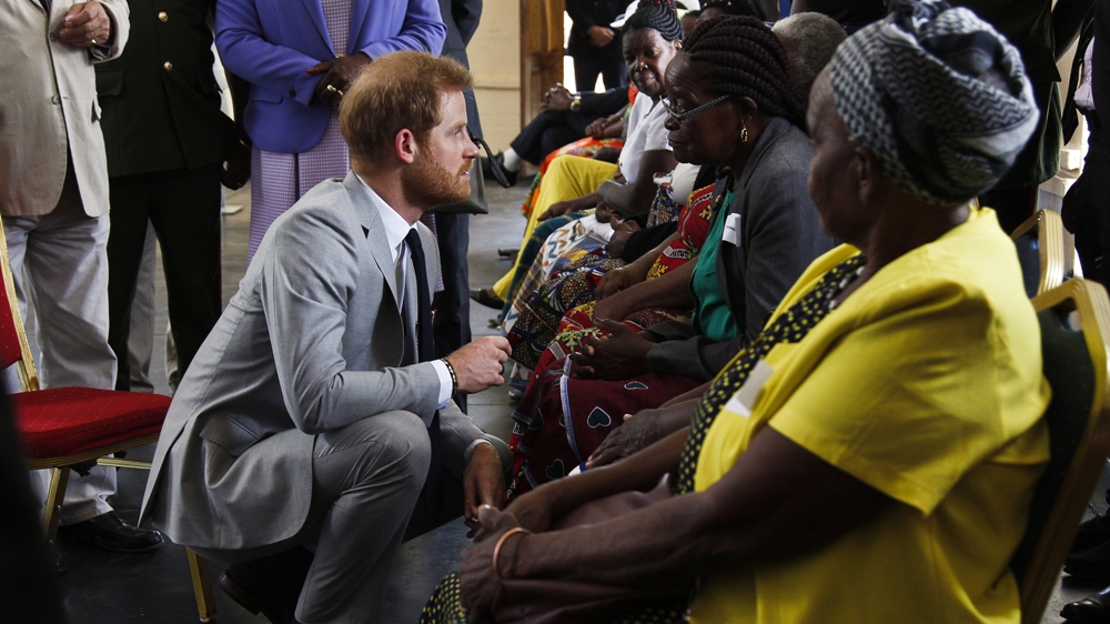 Prince Harry meets with surviving African veterans and relatives. The numbers of Britain's African veterans are dwindling fast and calls to fully acknowledge their sacrifices continue [Jack Losh/Al Jazeera]