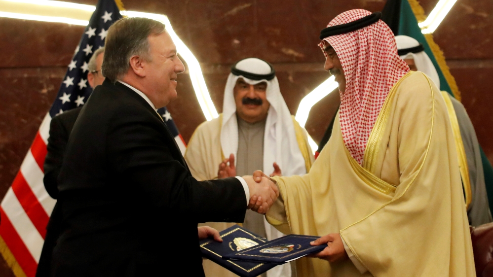 U.S. Secretary of State Mike Pompeo shakes hands with Kuwait''s Foreign Minister Sheikh Sabah Al-Khalid Al-Sabah in Kuwait