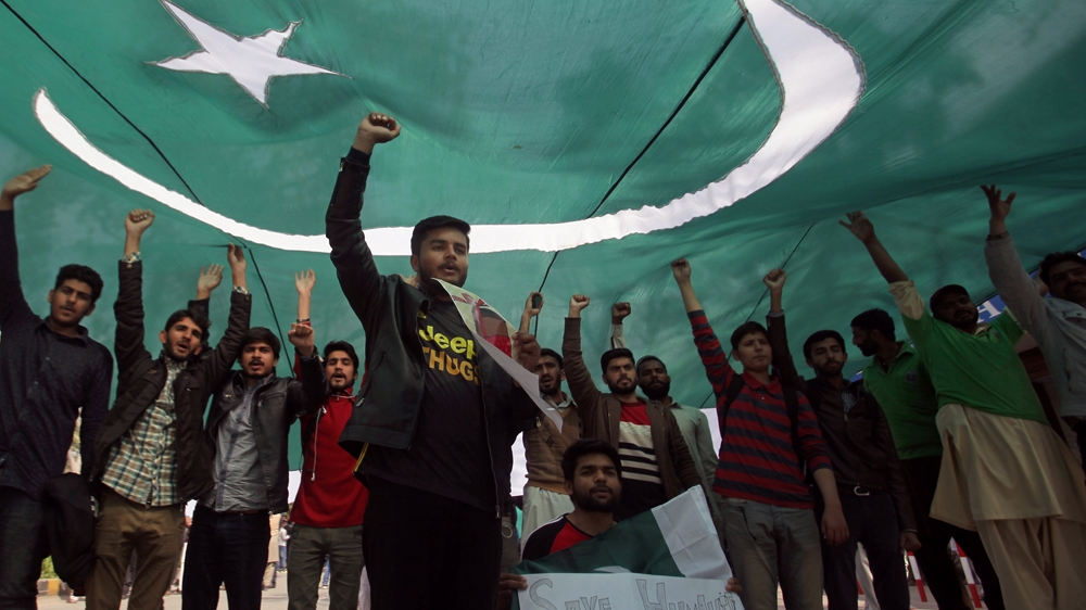 national flag Pakistan during a march in Lahore, Pakistan February 28, 2019.