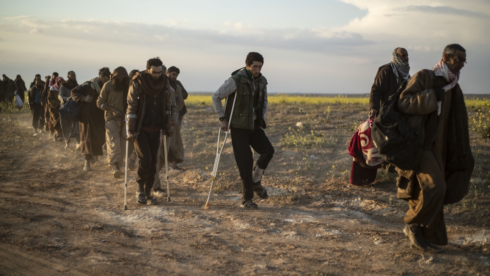 Syria - Suspected ISIL fighters in Baghouz