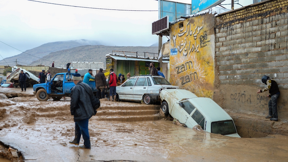 Damaged vehicles are seen after flash flooding in Shiraz last month [Tasnim News Agency/Reuters]