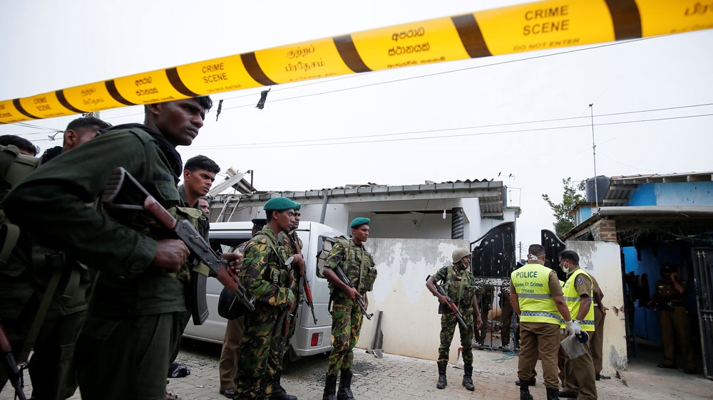 Security forces sealed off the site of an overnight gun battle in Kalmunai [Dinuka Liyanawatte/Reuters]
