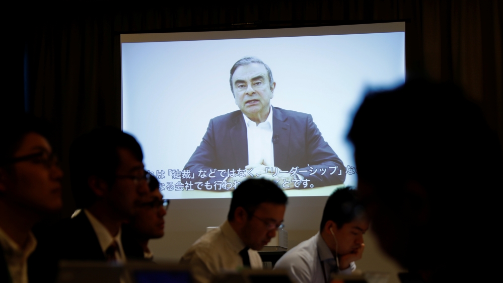 A video statement made by the former Nissan Motor chairman Carlos Ghosn is shown on a screen during a news conference by his lawyers at Foreign Correspondents'' Club of Japan in Tokyo