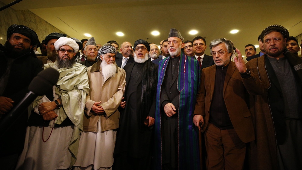Taliban meet Afghan politicians in Moscow for peace- - MOSCOW, RUSSIA - FEBRUARY 06: Head of Political Office of the Taliban Sher Mohammad Abbas Stanakzai (3rd L), former President of Afghanistan Hami