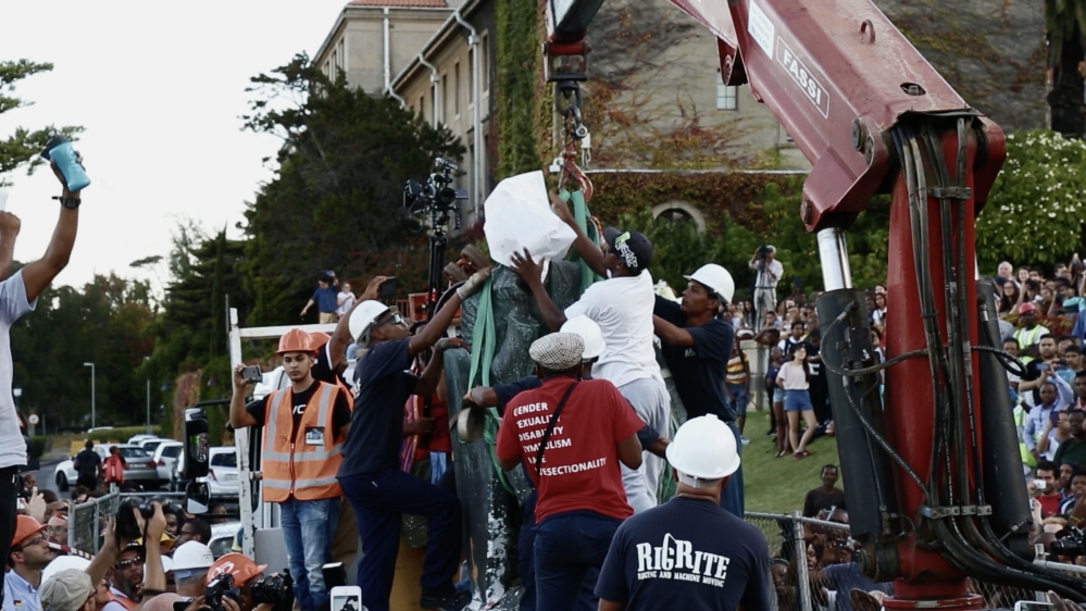Students at the University of Cape Town call for the dismantling of a statue of British imperialist Cecil Rhodes in 2015 [Screengrab/Al Jazeera]