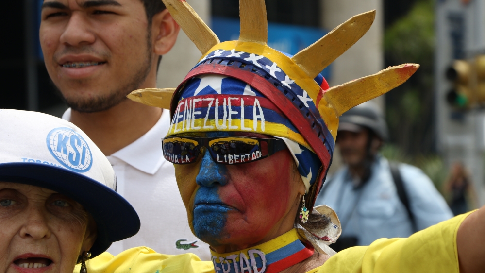 Across the world, May 1 is traditionally marked with strikes, parades and occasionally violent protests [Daniel Blanco/Anadolu]