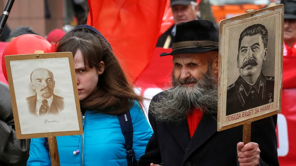 Supporters of the Russian Communist party took part in a May Day rally in Krasnoyarsk [Ilya Naymushin/Reuters]