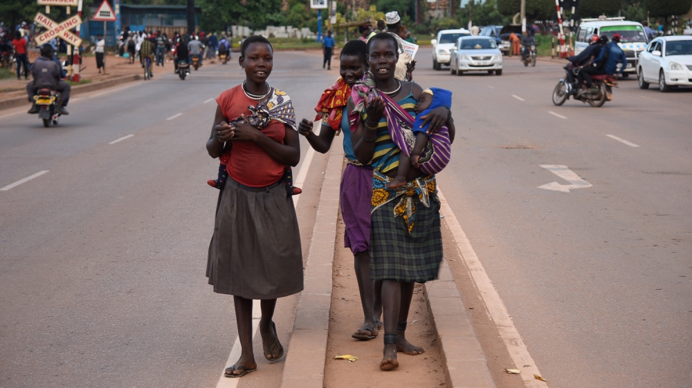 Kampala Street Children Gifts Ban [Isaac Kasamani/Al Jazeera]