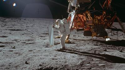 Apollo 11 astronaut Buzz Aldrin works on a solar wind experiment device on the surface of the moon. [File: NASA/AP Photo] 