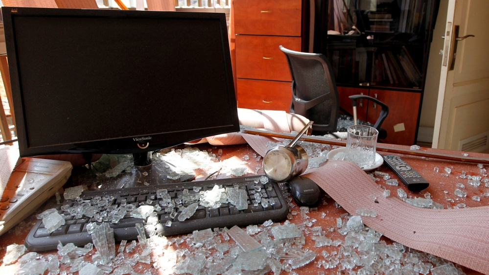 Damage and glass from broken windows is seen inside Hezbollah media center after an Israeli drone fell in the Hezbollah-dominated southern suburbs and a second one exploded near the ground in Dahiyeh 