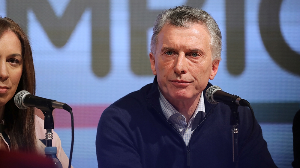 Argentina''s incumbent President and presidential candidate Mauricio Macri is seen on stage during the primary elections, at a convention centre in Buenos Aires, Argentina, August 11, 2019. REUTERS/Lu