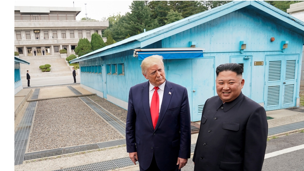 Trump and Kim Jon Un at the DMZ
