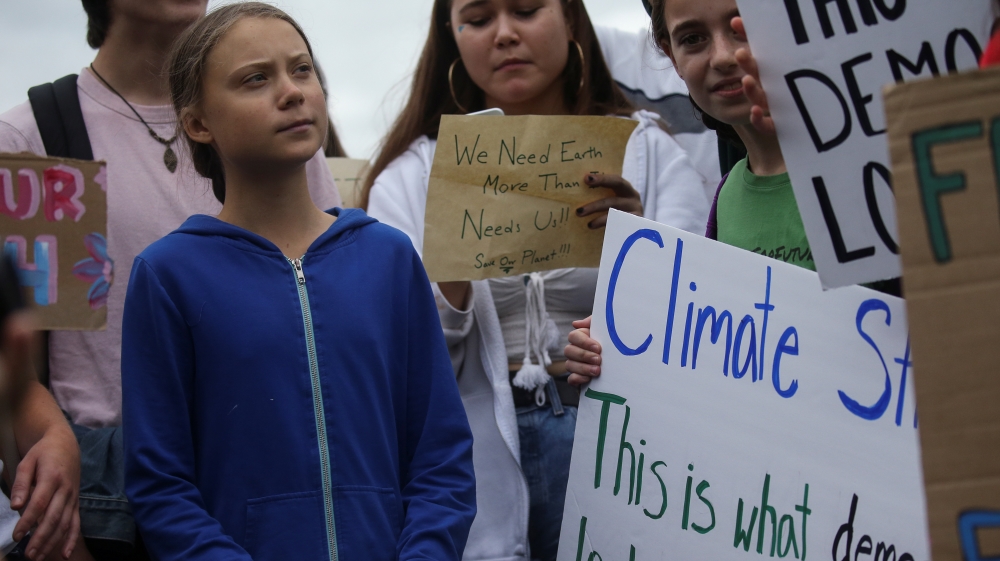 Swedish teen climate activist Thunberg and environmental advocates rally near the White House in Washington