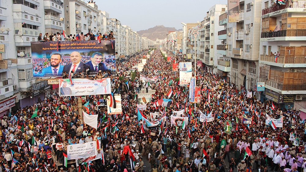 Supporters of southern separatists gather with the flags of south Yemen and the United Arab Emirates (UAE) during a rally to show support to the United Arab Emirates amid a standoff with the internati