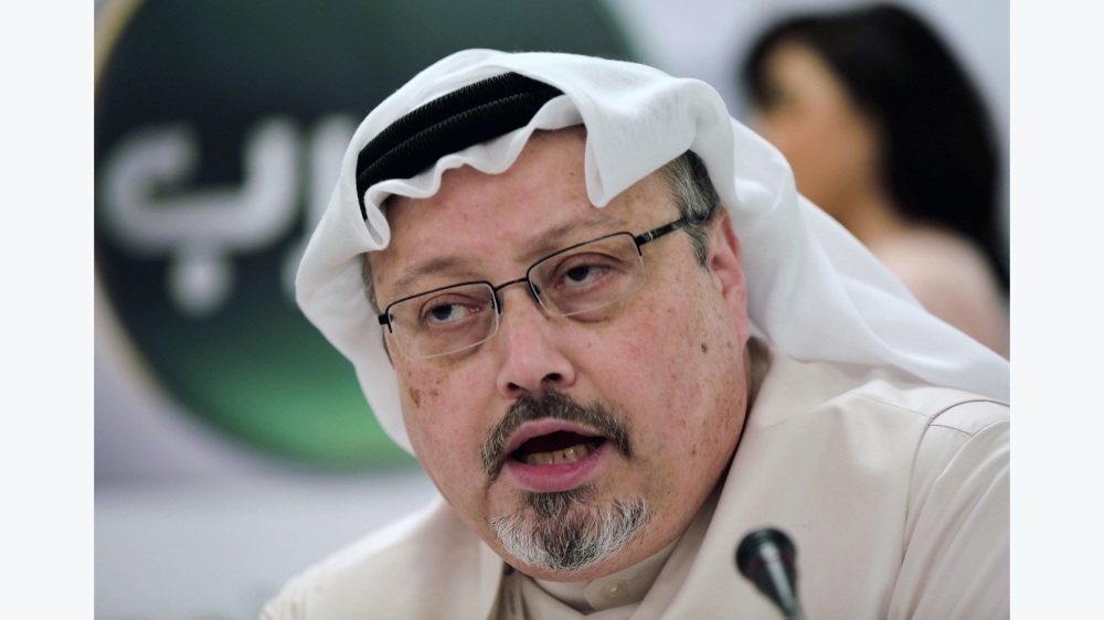 FILE - In this Dec. 15, 2014 file photo, Saudi journalist Jamal Khashoggi speaks during a press conference in Manama, Bahrain. An independent U.N. human rights expert investigating the killing of Saud