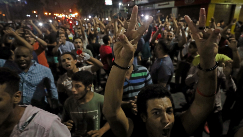 Small groups of protesters gather in central Cairo shouting anti-government slogans in Cairo