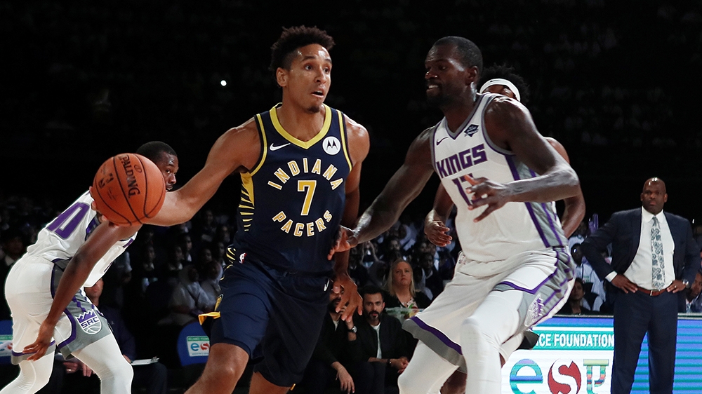 Basketball - NBA Preseason Friendly - Indiana Pacers v Sacramento Kings - NSCI Dome, Mumbai, India - October 4, 2019 Indiana Pacers' Malcolm Brogdon in action with Sacramento Kings' Dewayne Dedmon R