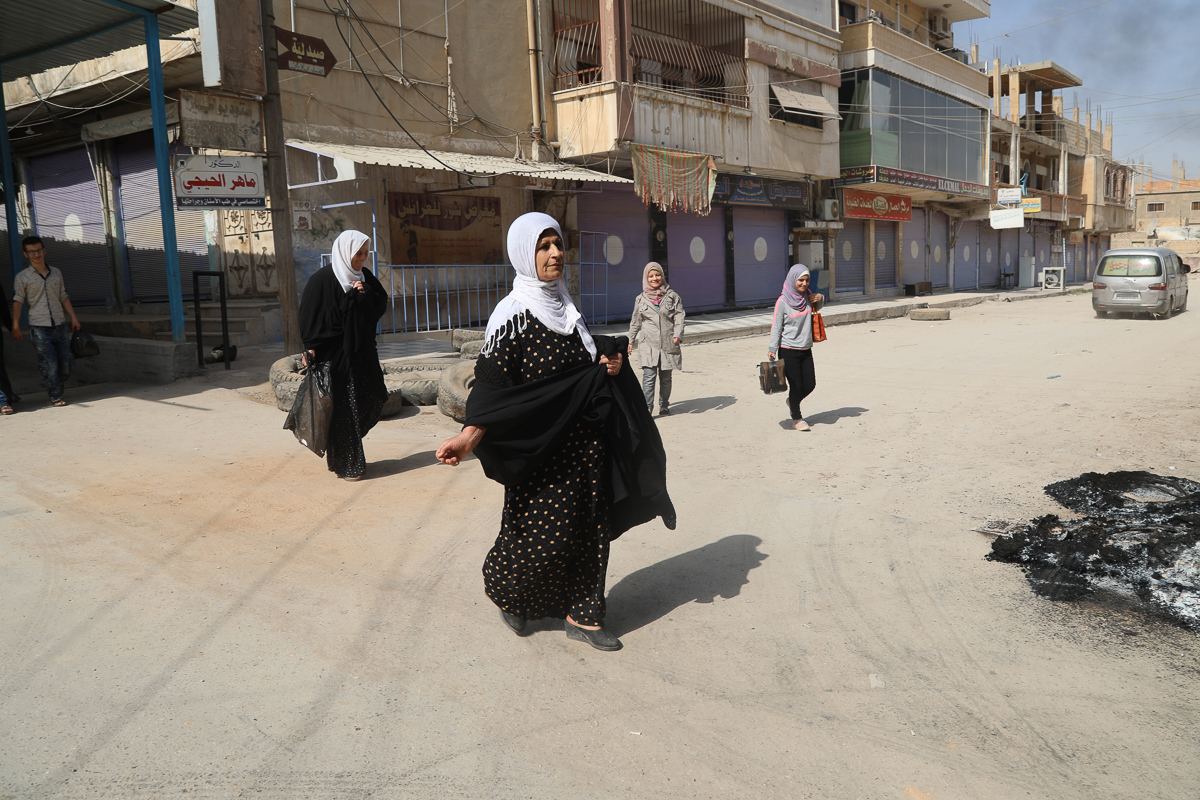 Kurdish civilians flee their homes after an offensive launched by Turkey in Ras al-Ein, in northern Syria, 11 October 2019. Turkey has launched an offensive targeting Kurdish forces in north-eastern S