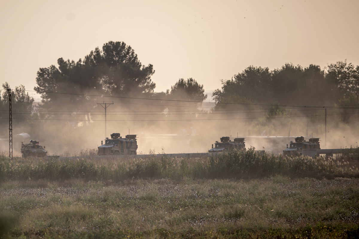 Turkish army vehicles drive towards the Syrian border near Akcakale in Sanliurfa province on October 9, 2019. - Turkey launched an assault on Kurdish forces in northern Syria on October 9 with air str
