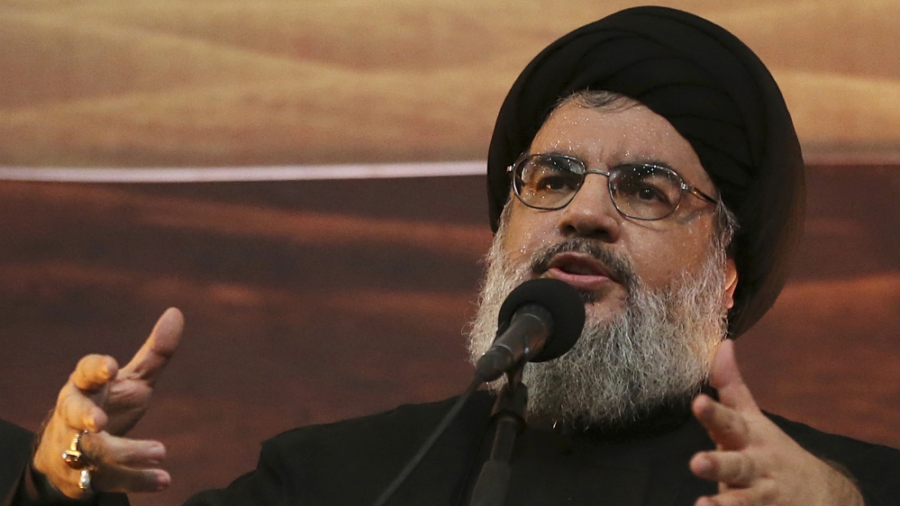 In this Nov. 3, 2014 file photo, Hezbollah leader Sheik Hassan Nasrallah addresses supporters ahead of the Shiite Ashura commemorations, in the southern suburb of Beirut, Lebanon. The leader of Hezbol