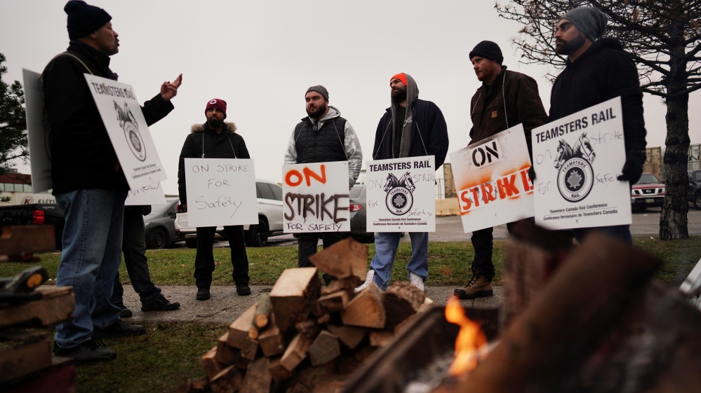 Teamsters workers picket outside the CN Rail Brampton Intermodal Terminal in Brampton