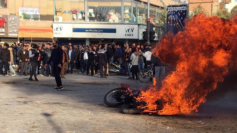 Iranian protesters clash in the streets following fuel price increase in the city of Isfahan, central Iran, 16 November 2019. Media reported that people protests in highways and in the streets after t