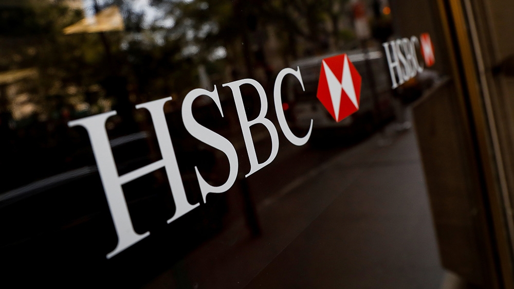 HSBC logos are seen on a branch bank in the financial district in New York, U.S., August 7, 2019