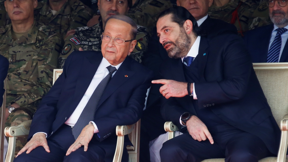 Lebanon''s caretaker Prime Minister Saad al-Hariri chats with Lebanon''s President Michel Aoun during a military parade to mark the 76th anniversary of Lebanon''s independence at