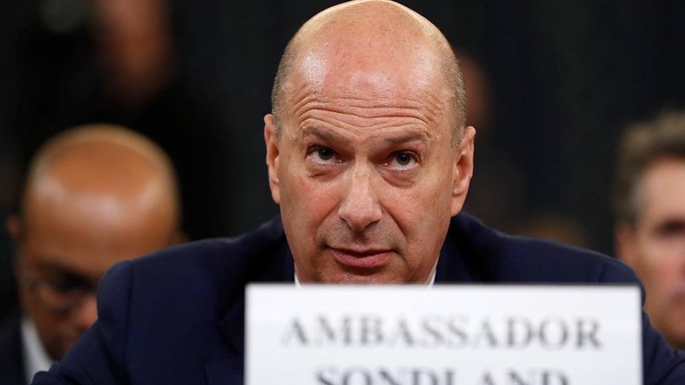U.S. Ambassador to the European Union Gordon Sondland listens to the closing statement of House Intelligence Committee Chairman Adam Schiff, D-Calif., before the House Intelligence Committee on Capito