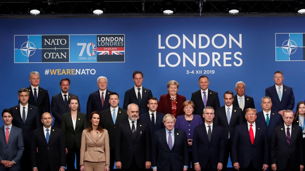 NATO leaders pose for a family photo during the NATO summit at the Grove hotel in Watford, northeast of London on December 4, 2019. CHRISTIAN HARTMANN / POOL / AFP