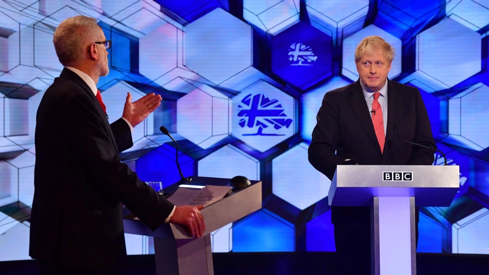 Opposition Labour Party leader Jeremy Corbyn gestures as British Prime Minister Boris Johnson 