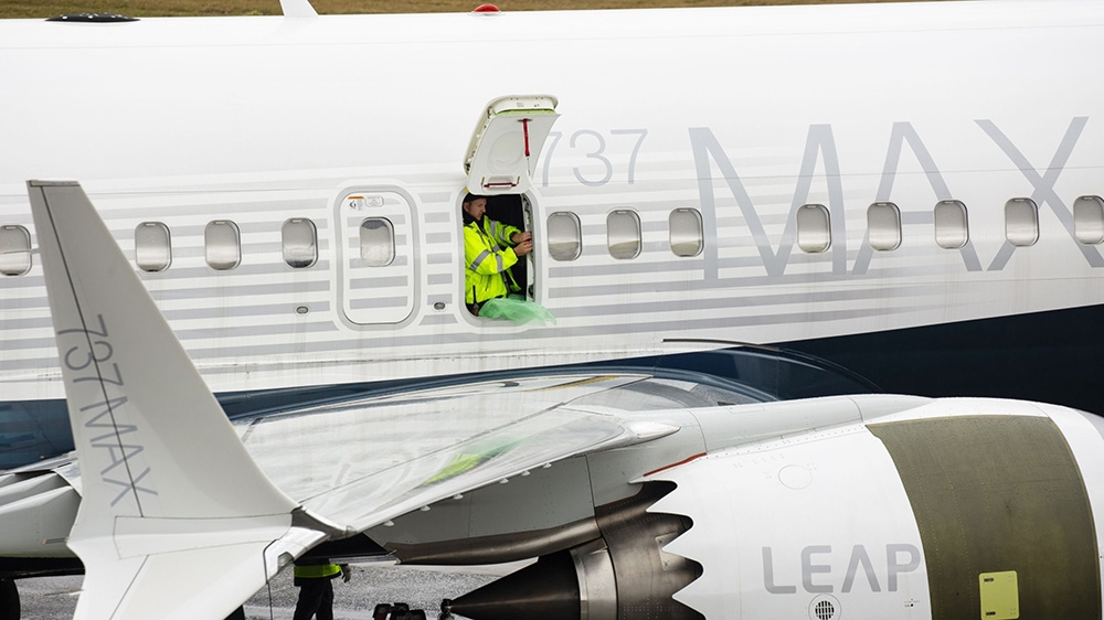 An employee works on a Boeing Co. 737 Max 9 plane at the company''s manufacturing facility in Renton, Washington, US, on Tuesday, Mar. 12, 2019