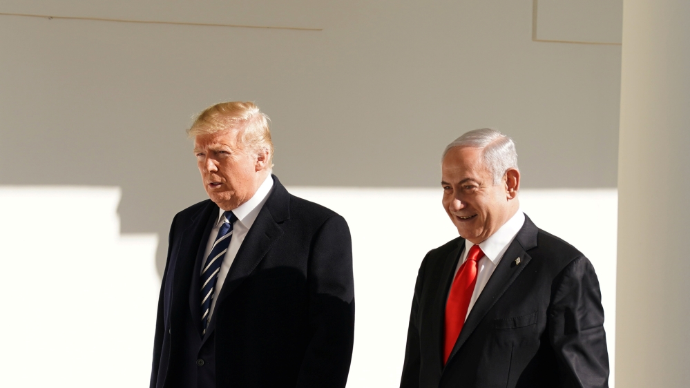 U.S. President Donald Trump and Israeli Prime Minister Benjamin Netanyahu walk to the Oval Office of the White House in Washington, U.S., January 27, 2020. REUTERS/Kevin Lamarque