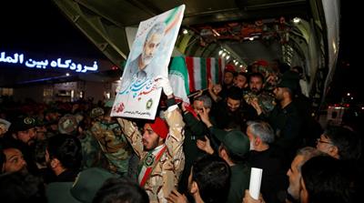 Iranian mourners carry the coffin of the Iranian Major-General Qassem Soleimani, head of the elite Quds Force, who was killed in an air strike at Baghdad airport, at Ahvaz international airport, in Ah