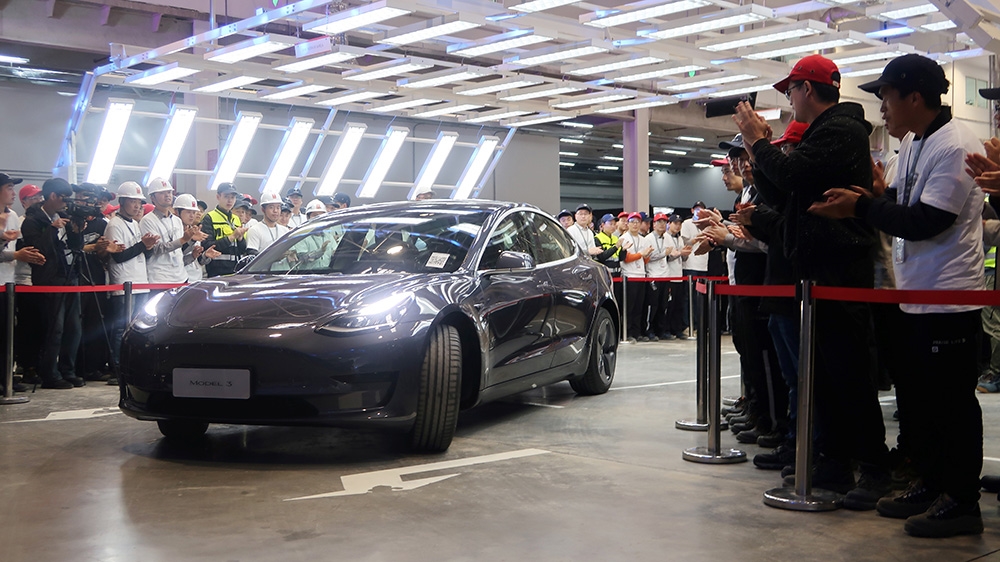 A China-made Tesla Model 3 vehicle is seen at a delivery ceremony in the Shanghai Gigafactory of the U.S. electric car maker in Shanghai, China December 30, 2019
