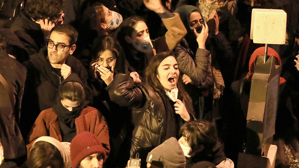 Iranians students chant slogans as they demonstrate following a tribute for the victims of Ukraine International Airlines Boeing 737 in front of the Amirkabir University in the capital Tehran, on Janu