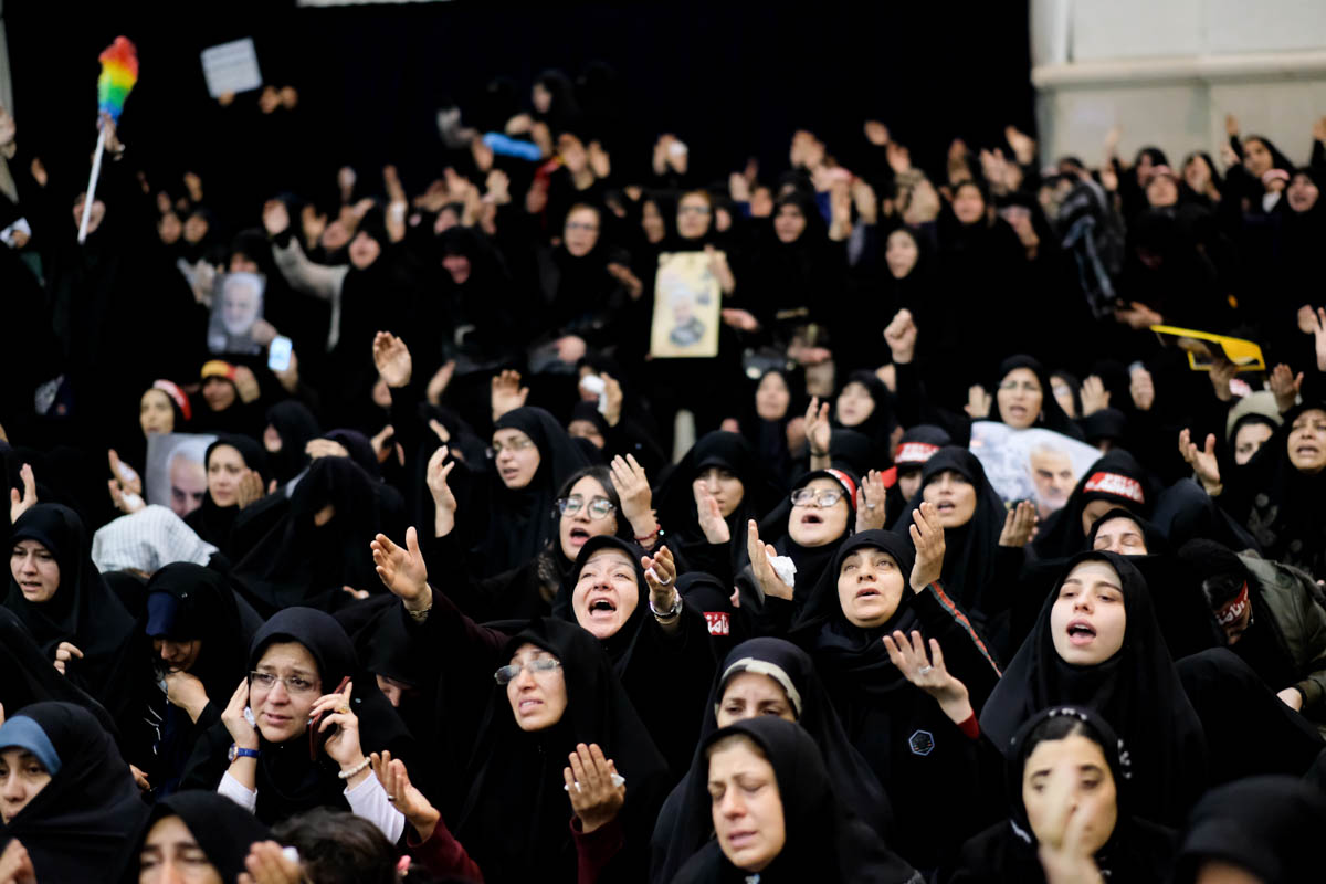 A repeated cry among the group of mourners for Soleimani is a call to “avenge” his killing.