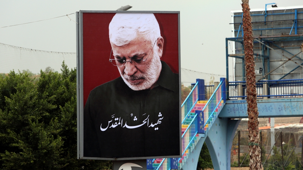 A picture of late Iraqi militia commander Abu Mahdi al-Muhandis is seen in Beirut''s suburbs