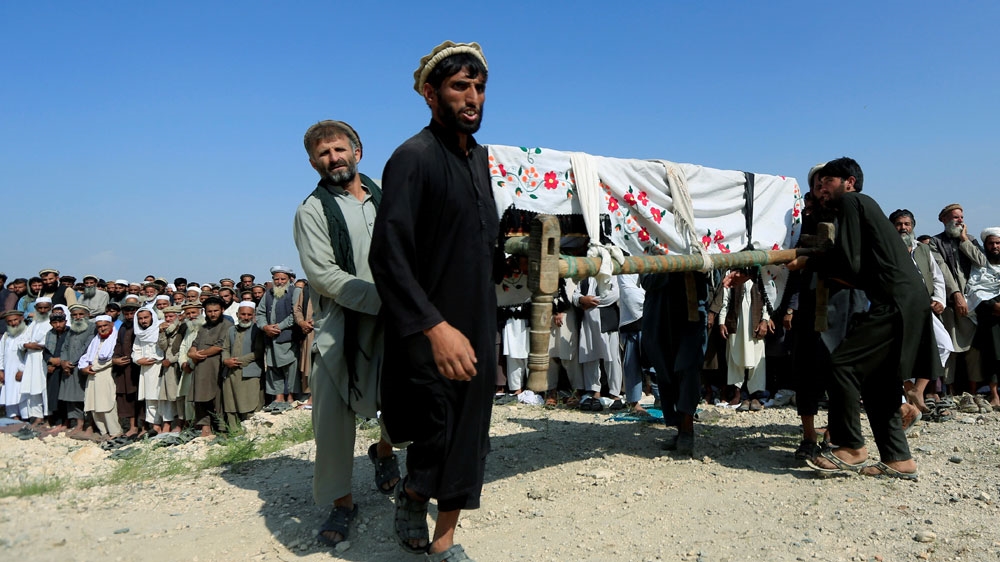 INDIA - TOURISM - HERITAGEMen carry a coffin of one of the victims after a drone strike, in Khogyani district of Nangarhar province, Afghanistan