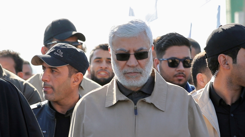 FILE PHOTO - Abu Mahdi al-Muhandis, a commander in the Popular Mobilization Forces attend a funeral procession of Hashd al-Shaabi members, who were killed by U.S. air strikes in Qaim