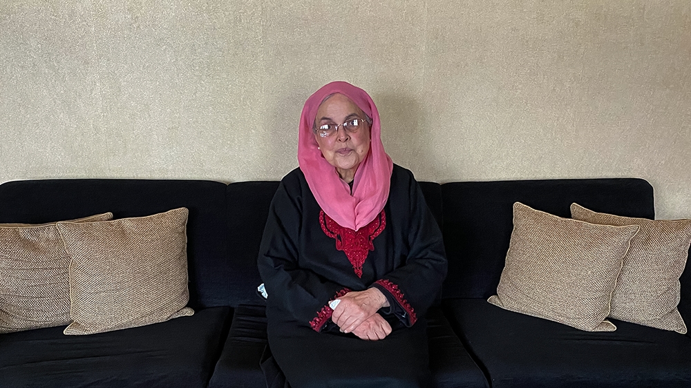 Khalida Shah at her home in Srinagar. [Rifat Mohidin/Al Jazeera]